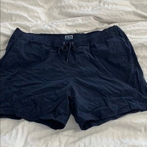 J. Crew swim trunks in classic navy blue.